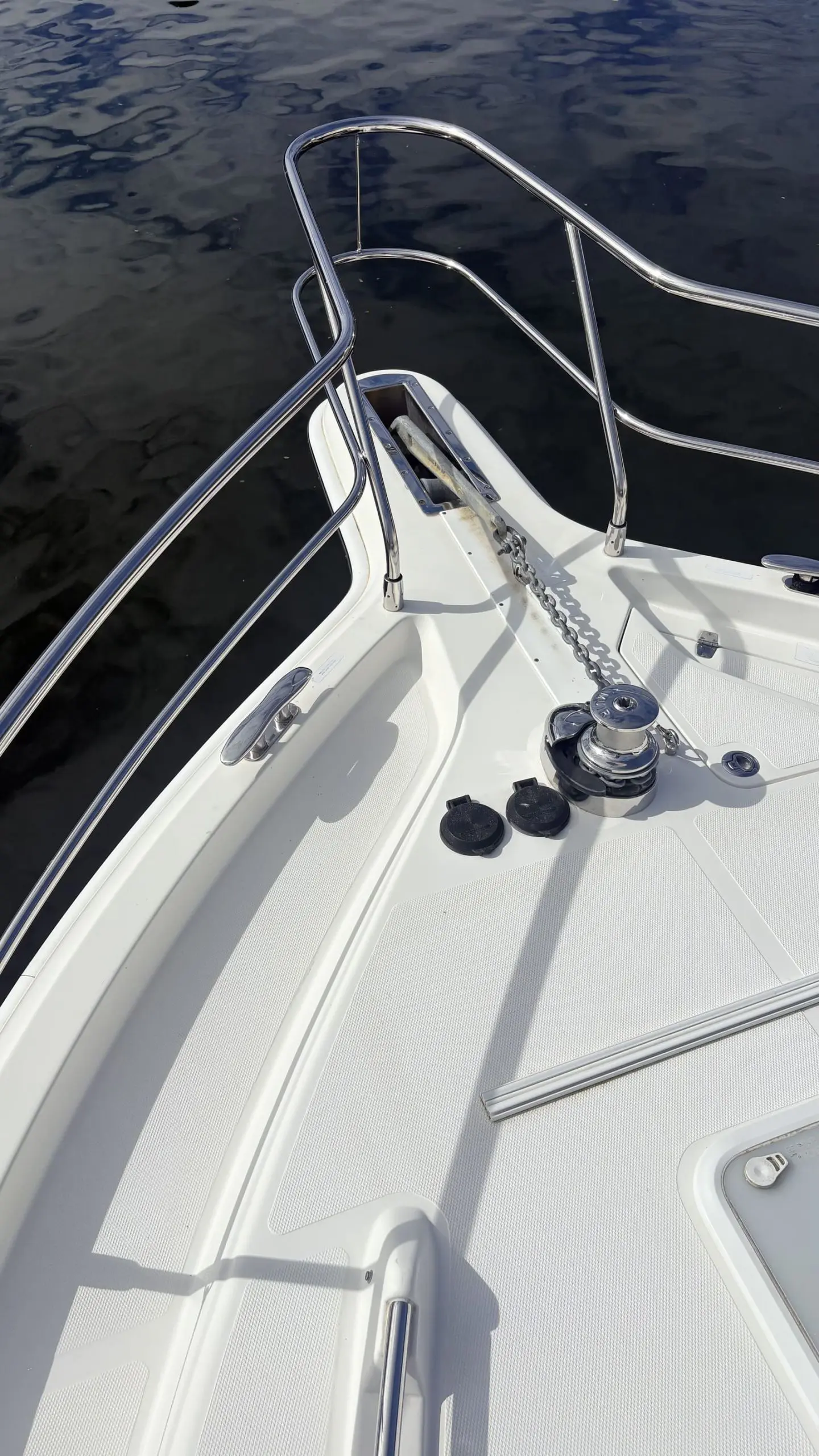 Polished stainless bow hardware and windlass on a boat prepared for sale in Sydney