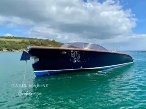 2013 Cockwells 9.5 metre Grace superyacht tender with Flag Blue hull and varnished mahogany decks