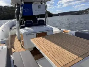 Aft cockpit dining table and wraparound seating of the Mar.Co 35 R-Evolution at anchor