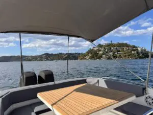 Aft cockpit dining table under the sun canopy on the Mar.Co 35 R-Evolution