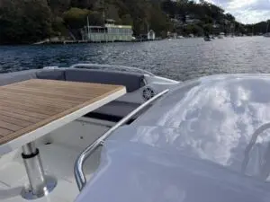 Forward day bed and teak table on the Mar.Co 35 R-Evolution