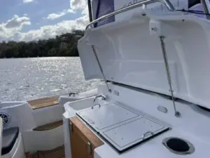 Driver bench lid raised showing the galley and storage on the Mar.Co 35 R-Evolution