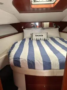 Forward master cabin of the Chris-Craft Roamer 43 with centreline queen island berth