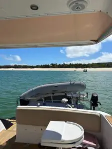 Cockpit of the Chris-Craft Roamer 43 looking aft to the tender on davits