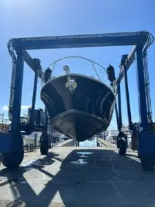 Chris-Craft Roamer 43 Heritage hauled out on the travel lift showing the hull