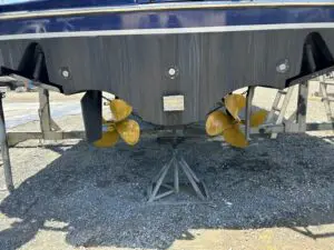 Underwater hull, props and rudders of the Chris-Craft Roamer 43 on the hardstand