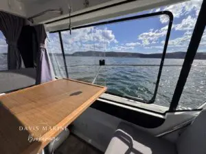 2020 Jeanneau Merry Fisher 895 saloon table and wheelhouse window