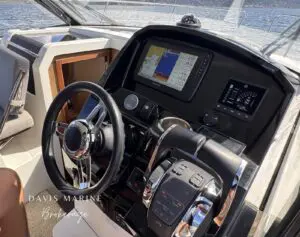 2020 Jeanneau Merry Fisher 895 helm with Garmin chartplotter and Mercury DTS controls