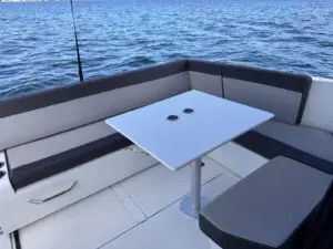 2020 Jeanneau Merry Fisher 895 cockpit lounge and table