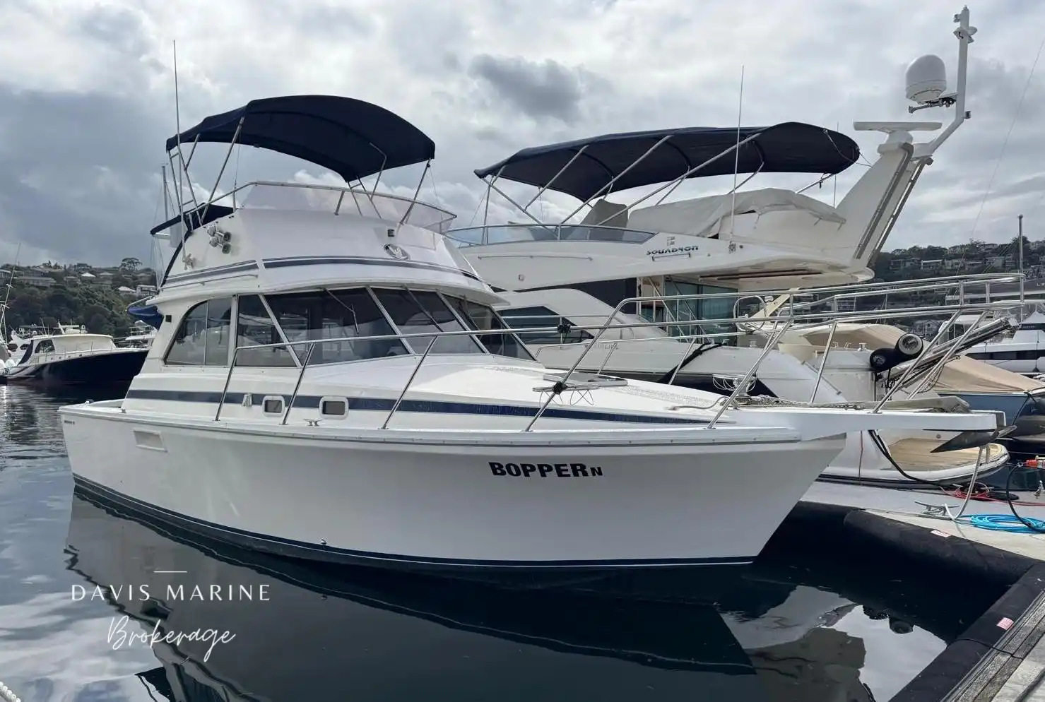 1997 Caribbean 35 Flybridge sold by Davis Marine Brokerage