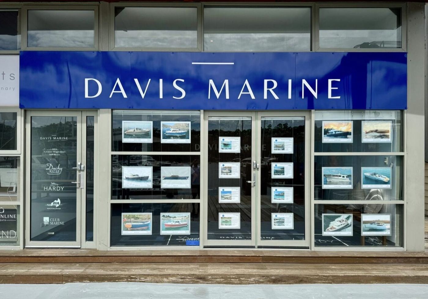 Davis Marine Brokerage office at Fergusons Marina, Parriwi Road, Mosman, with current boat listings in the window