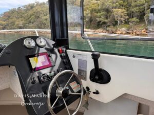 Helm of the Arvor 675 Sportsfish with Garmin chartplotter and engine controls
