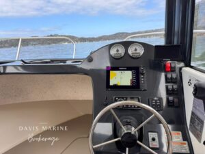 Helm station of the Arvor 675 Sportsfish looking forward through the wheelhouse glass