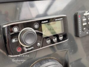 VHF radio and Garmin chartplotter at the Arvor 675 Sportsfish helm