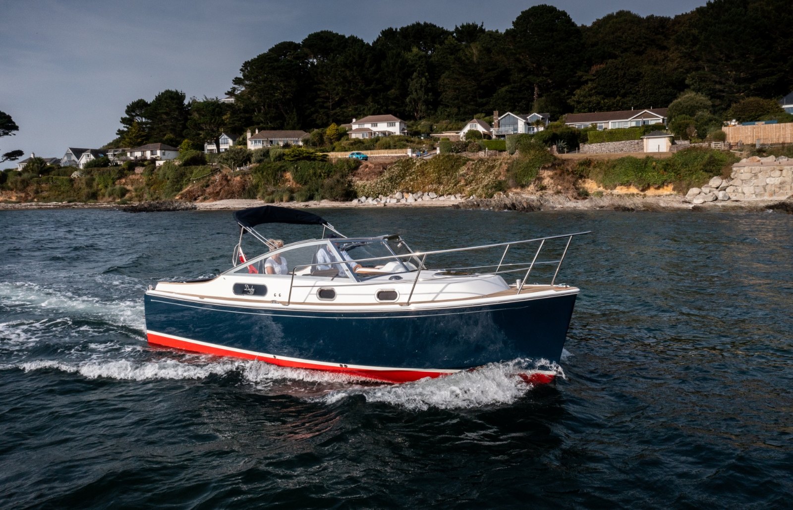The new Cockwells Duchy 25 motor launch on the water after its launch