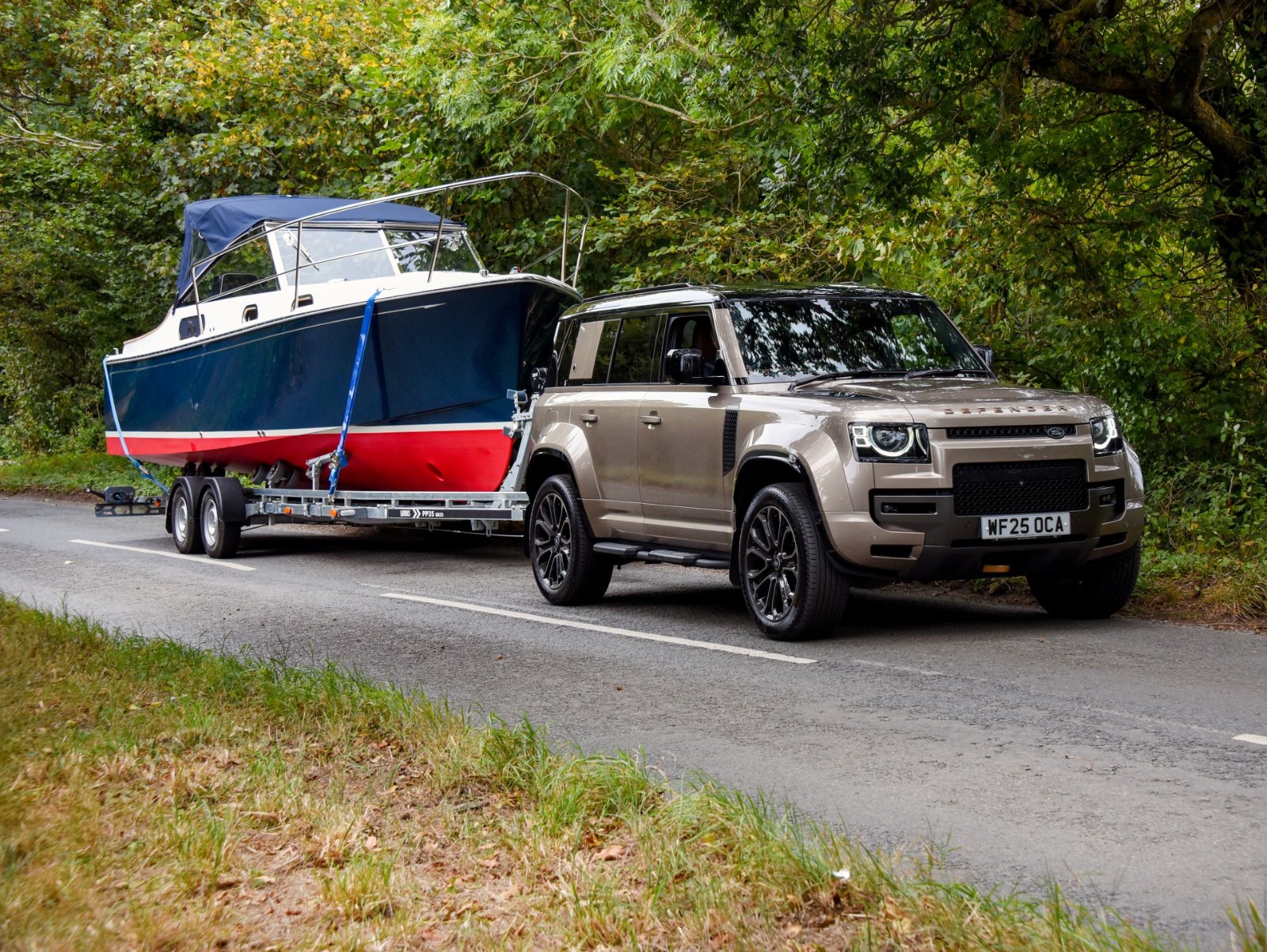 Cockwells Duchy 25 motor launch on its road trailer