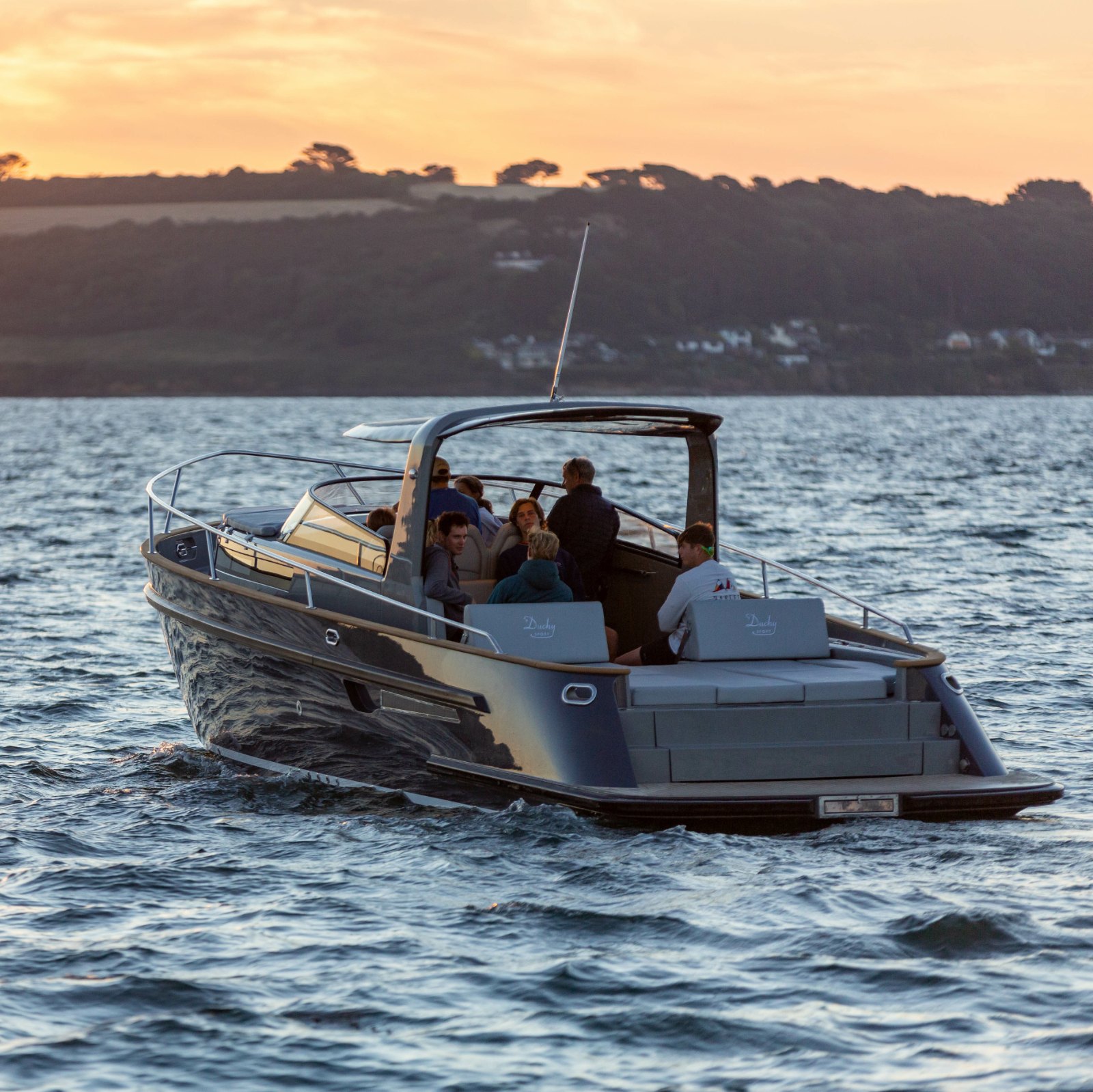 Cockwells Duchy Sport under way with guests aboard and its bimini raised, photographed around the Southampton International Boat Show 2022